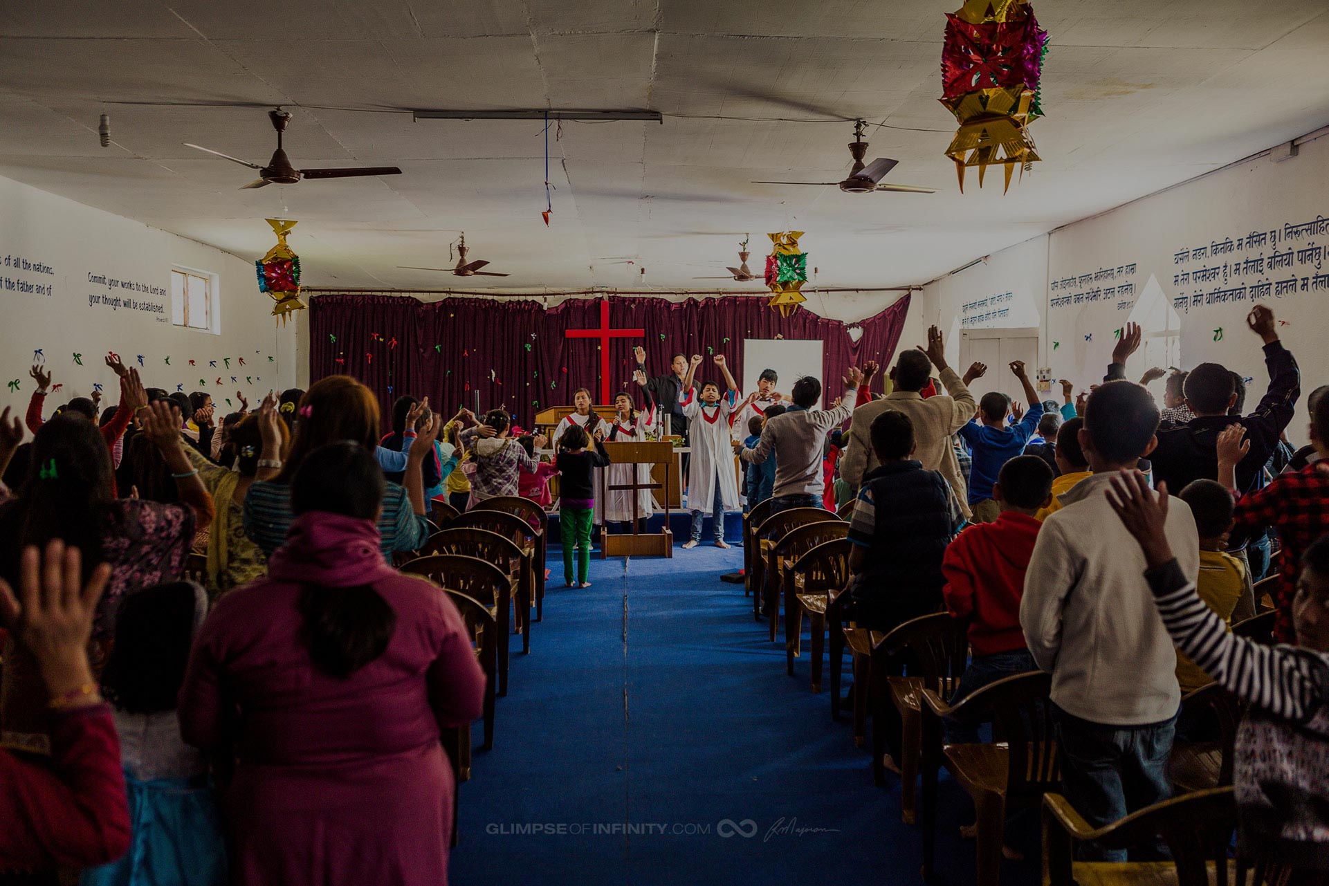 People in Nepal gather in a church to worship God.